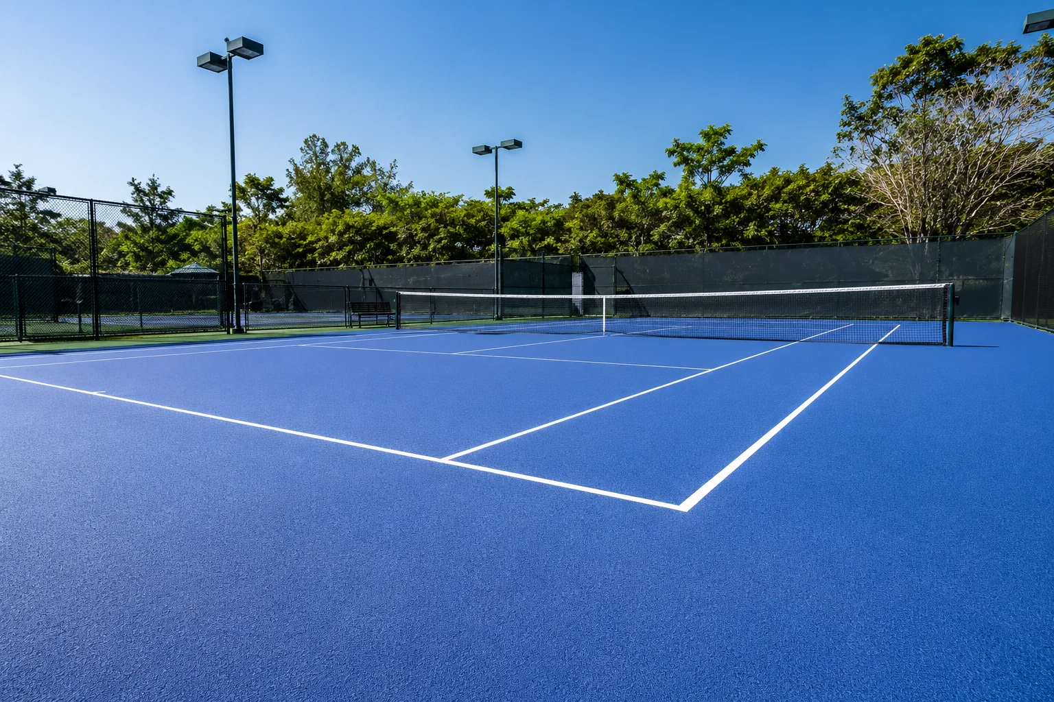 Cancha de tenis con sistema acrílico antiderrapante PLAYKO